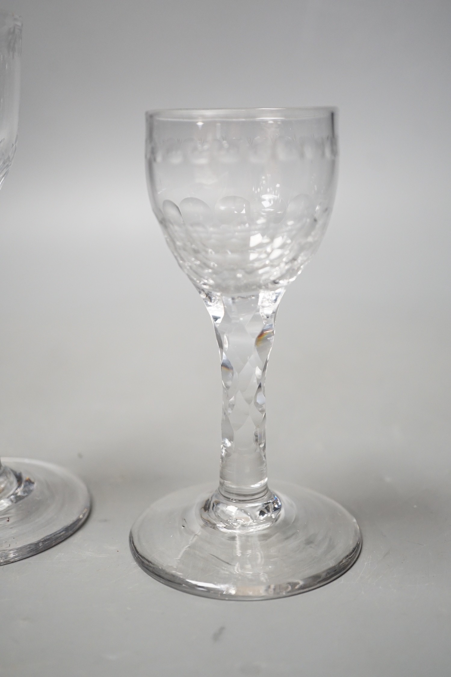 Three George III facet stem ‘OXO’ drinking glasses, tallest 15cms high